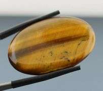 Dramatic 44.26ct Tiger Eye cabochon