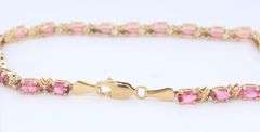 Handsome Yellow Gold oval Pink Tourmaline XO Bracelet