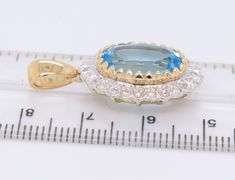 Blue Topaz and White Sapphire Pendant with Aquamarine and Sapphire Earrings