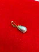 18k yellow gold and black pearl pendant