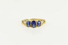 10K Yellow Gold Oval Three Stone Syn. Sapphire Diamond Ring