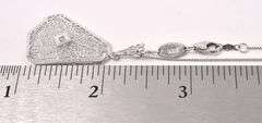 Interesting Diamond Pendant Necklace In 14K White Gold