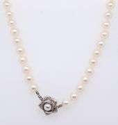 Elegant White Fresh water Pearl Necklace with 14kt White Gold Flower Clasp