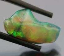High fire collectors 5.92ct free form black Opal vein