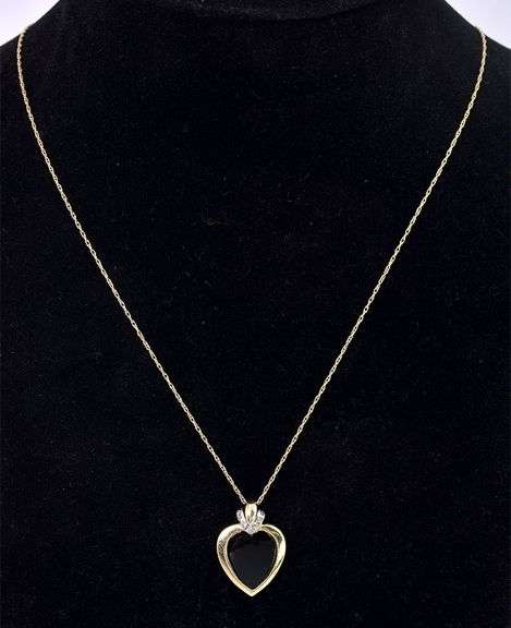 Endearing Black Onyx And Diamond Heart Pendant Necklace In 14K Yellow Gold