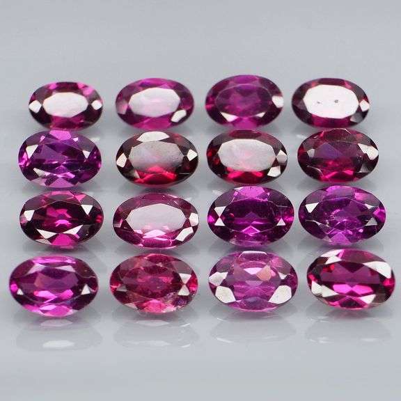 Amazing 8.92ct oval cut violet pink Garnet set