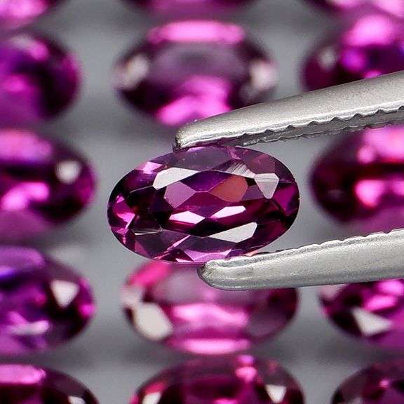 Ravishing 7.31ct violet pink Rhodolite Garnet set