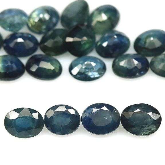 Heated only! 8.40ct blue green Sapphire set