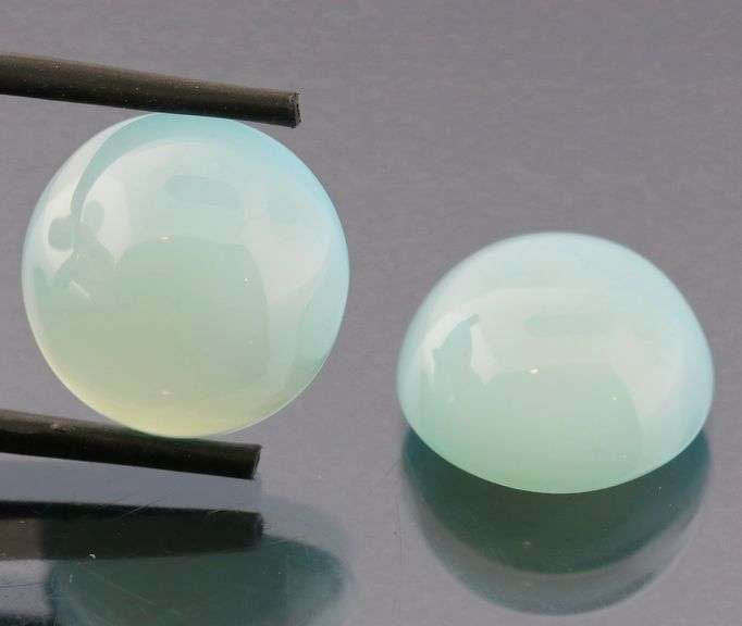 Glowing 17.00ct blue Chalcedony cabochon pair