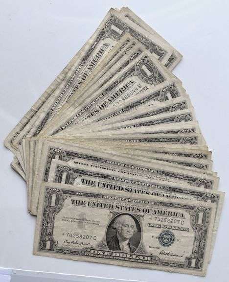 24 $1 1957 Silver Certificates Including 2 Stars