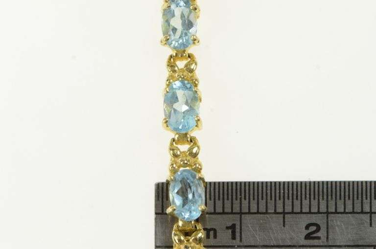 14K Yellow Gold Oval Blue Topaz Flower Blossom Tennis Bracelet