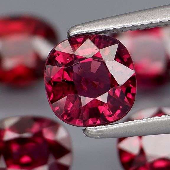 5.80ct premium cherry red Rhodolite Garnet set