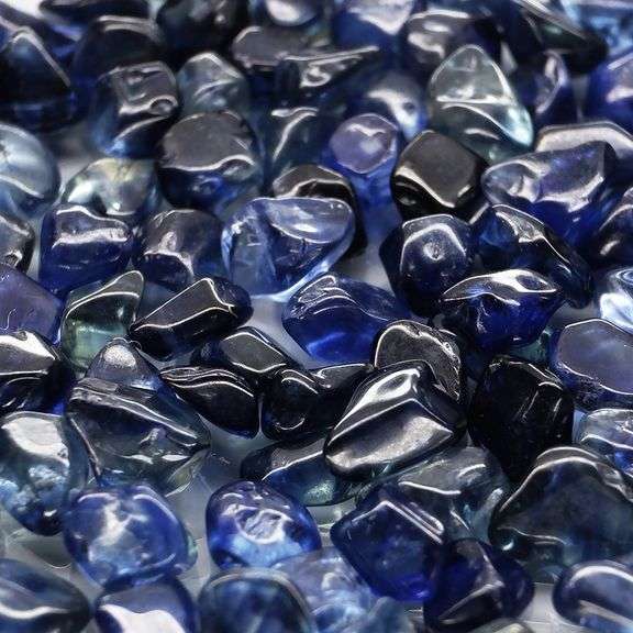 Really heavy and richly colored 31.20ct Sapphire set