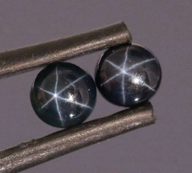 Stunning 1.71ct royal blue Star Sapphire pair