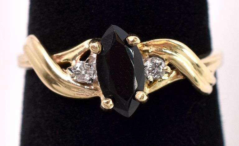 Extraordinary Black Gem and Diamond Ring In Yellow Gold