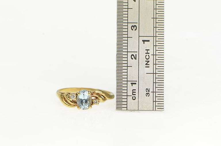 10K Yellow Gold Oval Blue Topaz Diamond Accent Bypass Ring