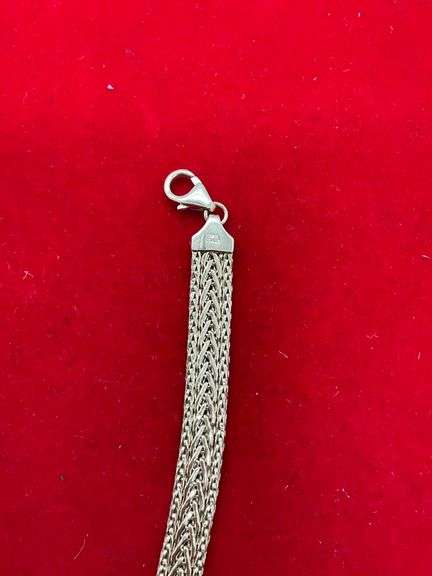 ITALIAN 18K YELLOW GOLD THREE ROW FLAT WHEAT LINK BRACELET.