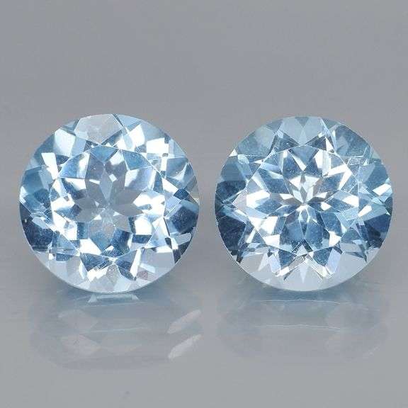 Eye clean 9.08ct round brilliant cut Topaz pair
