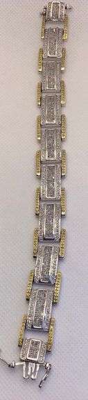 STRIKING 14K TWO TONE MEN’S WHITE AND YELLOW DIAMOND BRACELET