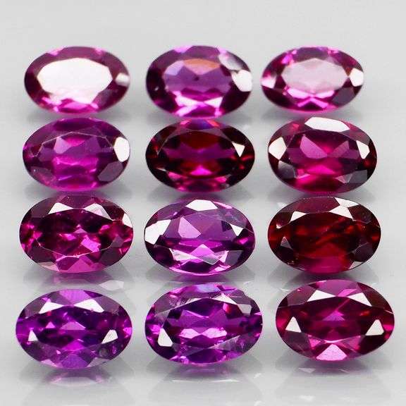 Rich 6.80ct oval cut violet pink Rodolite Garnet set