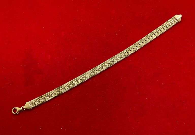 ITALIAN 18K YELLOW GOLD THREE ROW FLAT WHEAT LINK BRACELET.