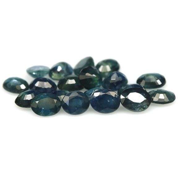 Heated only! 8.40ct blue green Sapphire set