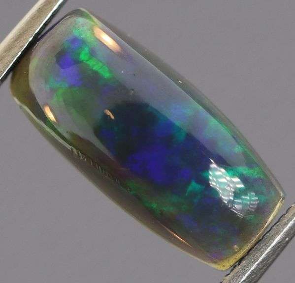 Outstanding 1.79ct full body flashing Black Opal