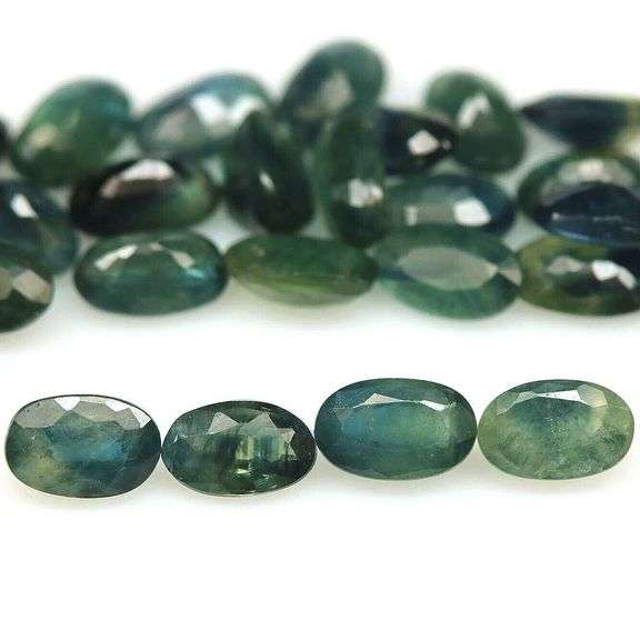 Rich blue green 8.64ct oval cut Sapphire set