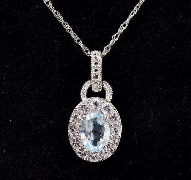 Blue Topaz and CZ Set In Sterling Silver