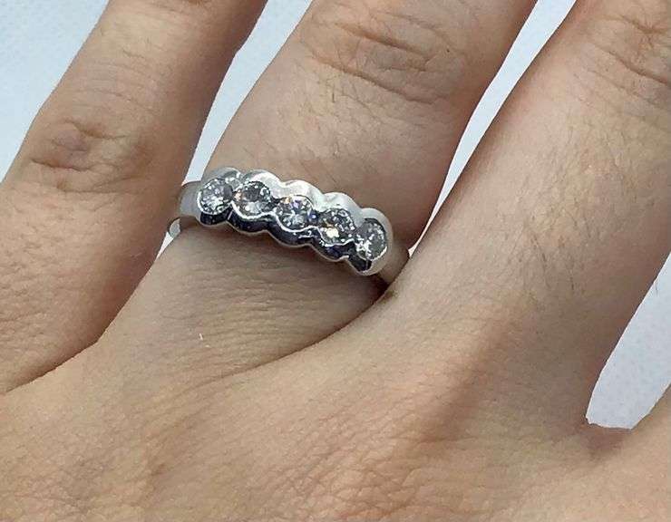 FANCY PLATINUM SEMI BEZEL SET DIAMOND RING