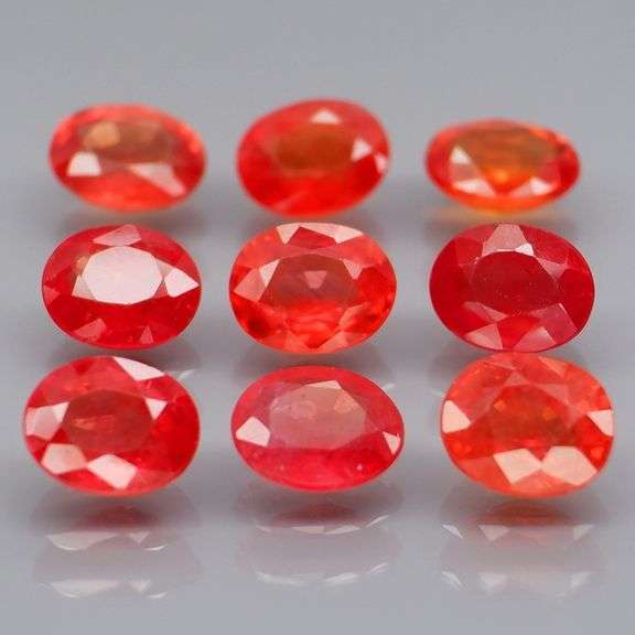 Uniquely colored 4.74ct Imperial red Sapphire set