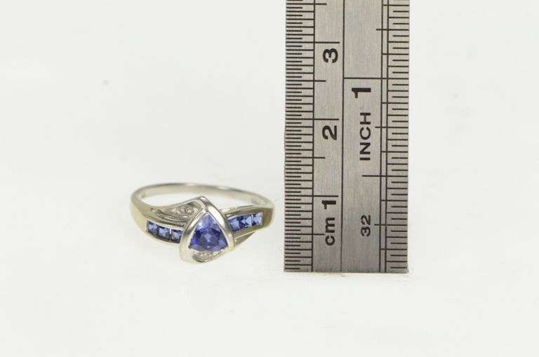 10K White Gold Trillion Syn. Sapphire Diamond Wavy Bypass Ring