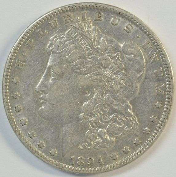High end 1894-O Morgan Silver Dollar. Lustrous AU