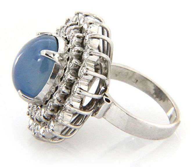 6.00ct Oval Star Sapphire Cabochon and 2.00ctw Diamond Starburst Frame Ring in 14K