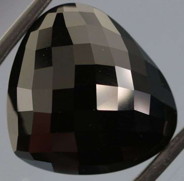 Elegant 30.01ct silky black Laos Tektite