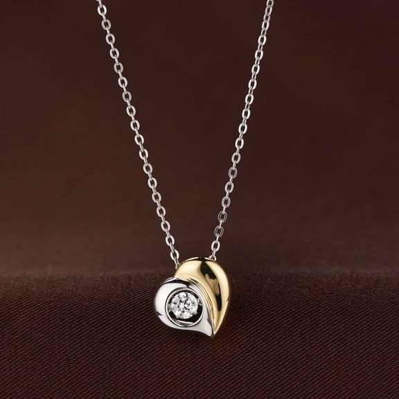 Two tone plated 925 Sterling silver heart dancing stone pendant