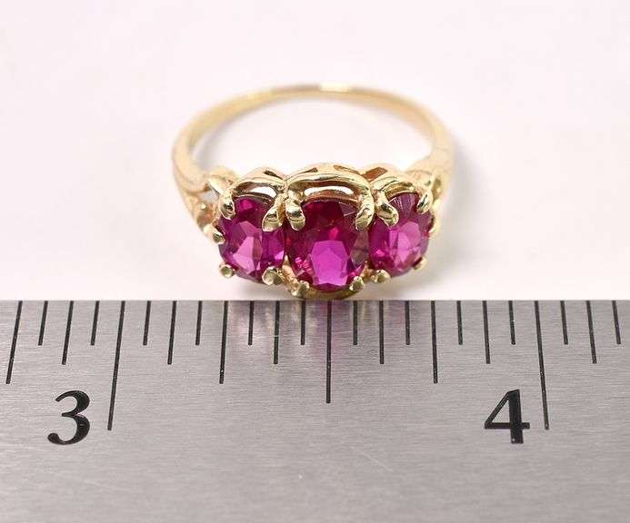Graceful Synthetic Pink Sapphire Ring In Yellow Gold