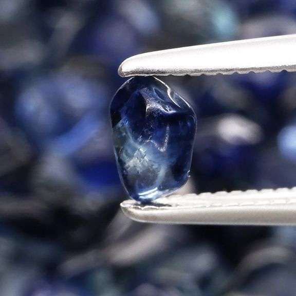 Really heavy and richly colored 31.20ct Sapphire set