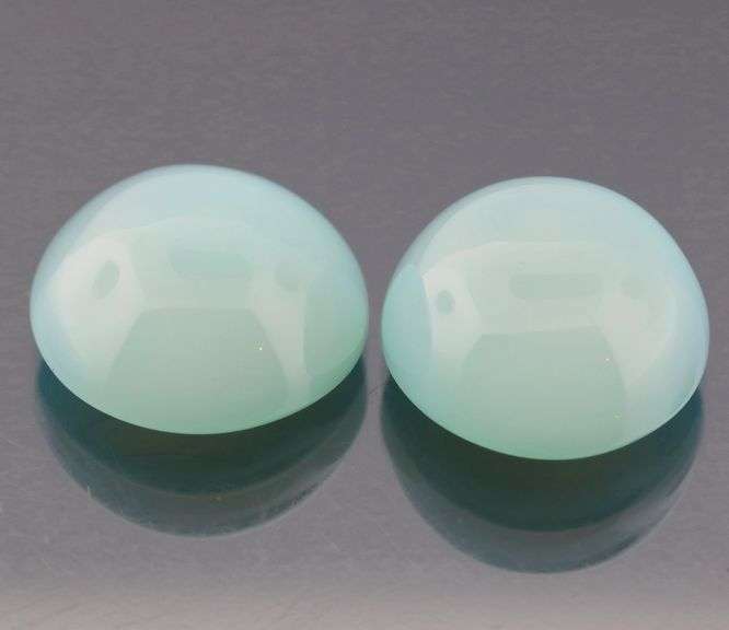Glowing 17.00ct blue Chalcedony cabochon pair