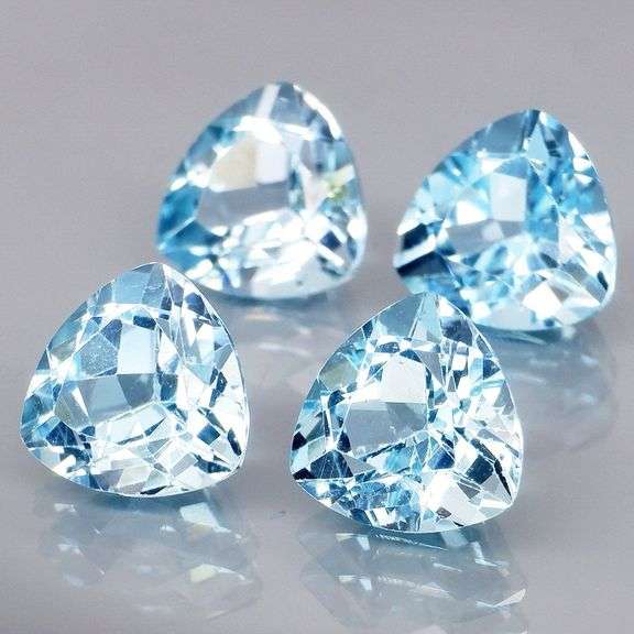 Matched! 4 piece 8.59ct full fire sky blue Topaz set
