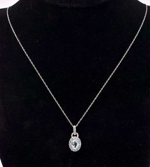Blue Topaz and CZ Set In Sterling Silver