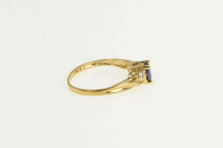 10K Yellow Gold Oval Syn. Sapphire Cubic Zirconia Accent Ring