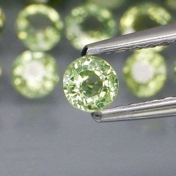 Fantastic 6.23ct diamond cut GREEN Sapphire set
