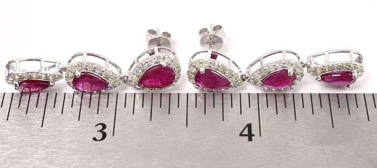 Captivating Burmese Ruby and Diamond Dangle Earrings In White Gold