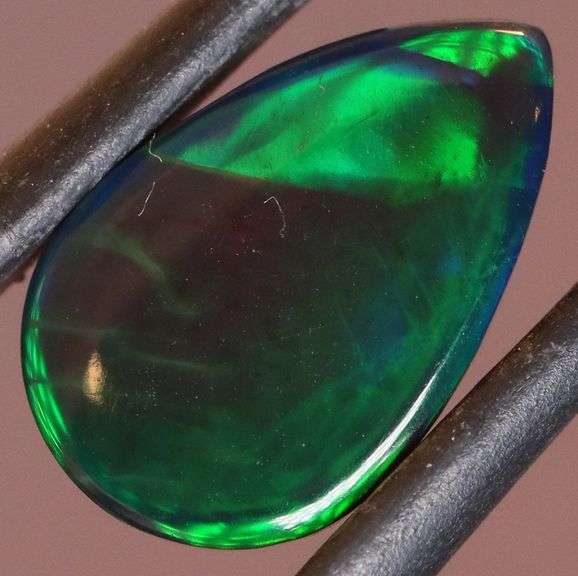 Magnificent 2.40ct teal and green flashing Black Opal