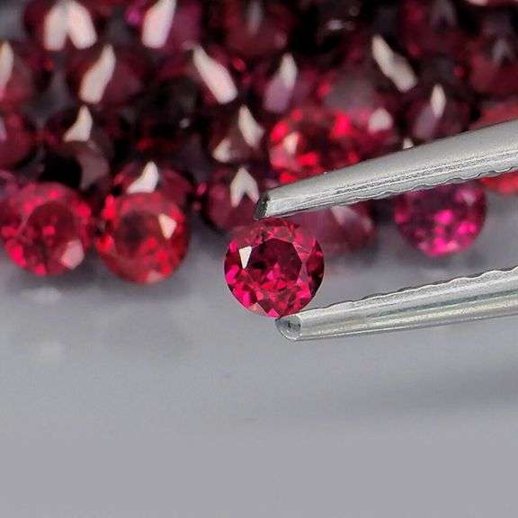 Premium diamond cut 7.77ct Rhodolite Garnet set
