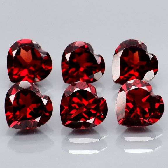 Top tier 5.63ct heart cut cherry red Garnet set