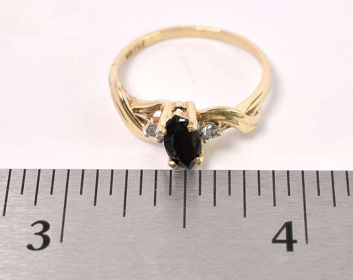 Extraordinary Black Gem and Diamond Ring In Yellow Gold
