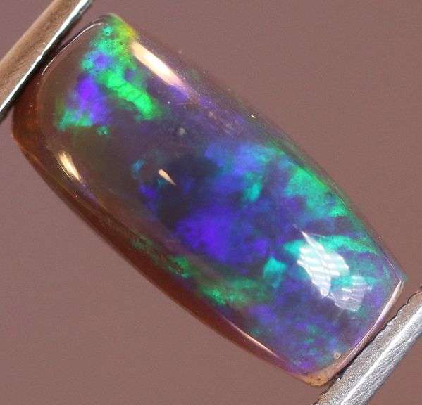 Outstanding 1.79ct full body flashing Black Opal