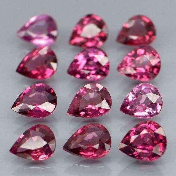 Premium pear cut 7.52ct VS Rhodolite Garnet set